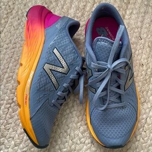 New Balance Gray and Orange Athletic Shoes with Cushioned Midsole